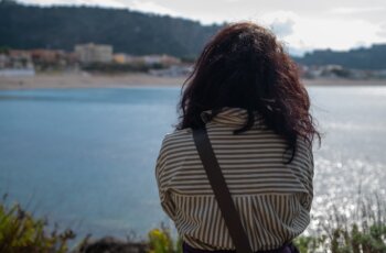 Woman,Photographed,From,Behind,While,Observing,The,Panorama,Of,The
